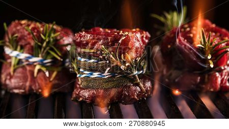 Fresh Fillet Steak On Grill With Flammes.
