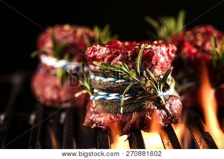 Fresh Fillet Steak On Grill With Flammes.