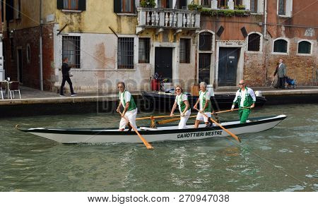 Venice, Italy -  September 23, 2017: Venetain Rowing Team On The Cannaregio Canal Venice Italy.