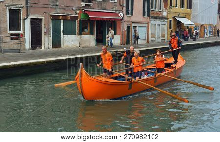 Venice, Italy -  September 23, 2017: Venetain Rowing Team On The Cannaregio Canal Venice Italy.
