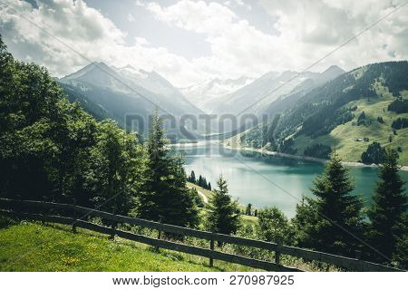 Great panorama of the Durlassboden reservoir. Location municipality of Gerlos, Zillertal valley, Austrian states of Tyrol and Salzburg, Europe, High Tauern National Park. Discover the beauty of earth.