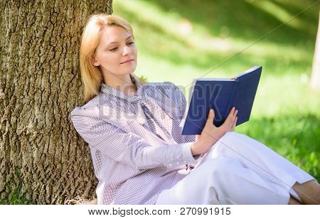 Female Self Improvement. Girl Lean On Tree While Relax In Park Sit Grass. Self Improvement Book. Sel