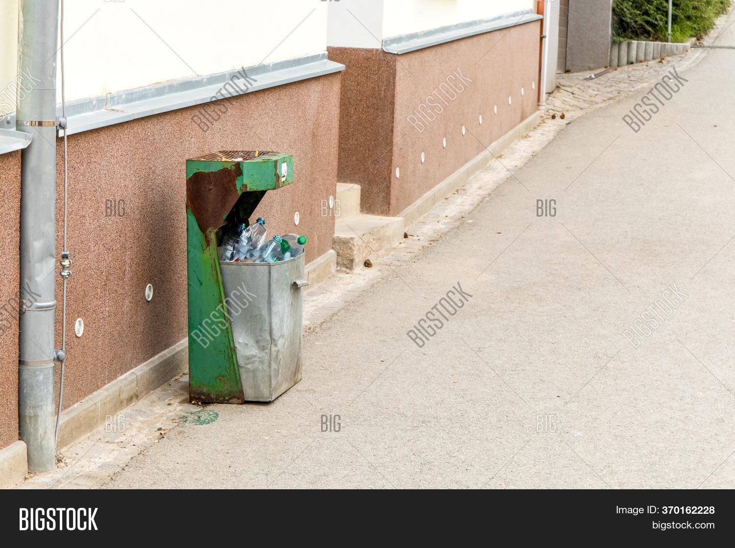 Trash Can On Street. Image & Photo (Free Trial) Bigstock