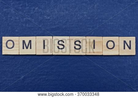 Text On Gray Word Omission In Small Wooden Letters With Black Font On A Blue Background