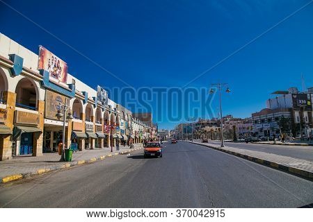 Hurgada, Egypt- Jan 27 , 2020: Areal view and traffic in main street of  Hurgada, South Sinai, Egypt.