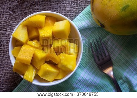 Imam Pasad Mango(considered King Of Mangoes) Cut Into Cube Shape. Tasty Himam Pasand Mangoes Sliced.