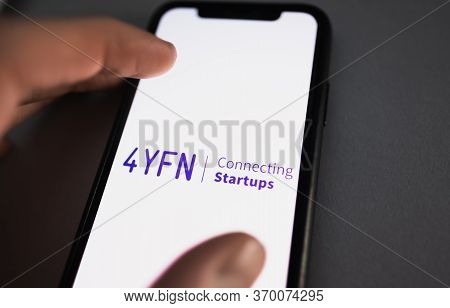 4yfn Logo On Smartphone Screen. High Quality Photo.