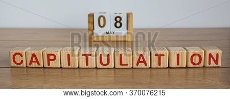 May 8 On The Calendar. Victory Day. Calendar On A White Background. Word Capitulation On Wooden Cube