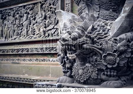 Sculpture Of Demon In  Pura Dalem Ubud Temple In Bali, Indonesia