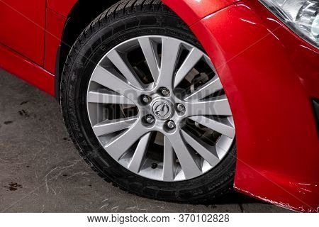 Novosibirsk/ Russia - March 04, 2020: Mazda 6, Car Wheel With Alloy Wheel And New Rubber On A Car Cl
