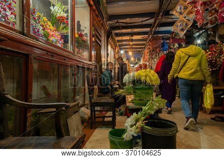 Kolkata, West Bengal, India - 29th December 2019 : Flowers Inside Showcase At Flower Market Of Espla