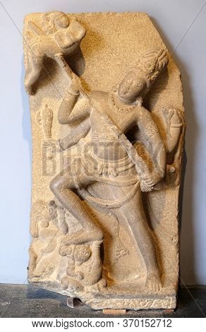 MUMBAI, INDIA - FEBRUARY 14, 2020: Statue of Andhakasuravadhamurti from 8th century exposed in the Prince of Wales Museum, now known as The Chhatrapati Shivaji Maharaj Museum in Mumbai, India