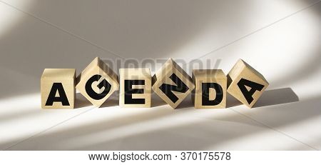 Agenda - Words From Wooden Blocks With Letters, A List Of Matters Agenda Concept, White Background