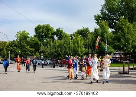 Ukraine, Kiev - June 5, 2020: Krishnaites Walk Along The Street, Sing And Dance. Religious Ukrainian