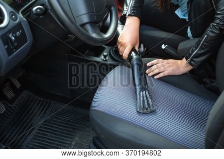 Woman Cleaning, Vacuuming Interior Of The Car By Vacuum Cleaner, Clean Dust And Rubish