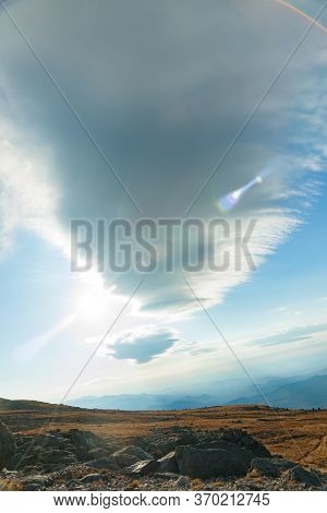 Large Cloud Over Mount Washington Landscape In New Hampshire Usa In Vertical Composition.