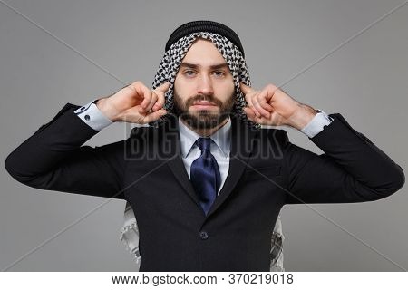 Young Bearded Arabian Muslim Businessman In Keffiyeh Kafiya Ring Igal Agal Classic Black Suit Shirt 