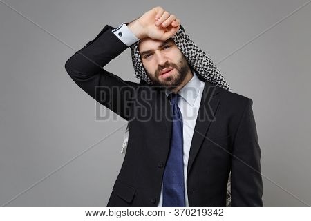 Tired Young Bearded Arabian Muslim Businessman In Keffiyeh Kafiya Ring Igal Agal Classic Black Suit 