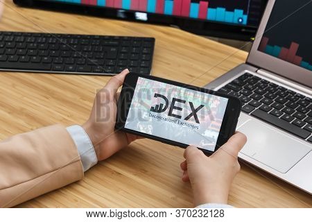 Dex Cryptocurrency Exchange Market. Female Trader Hands Holding The Smartphone Using Application. Cr