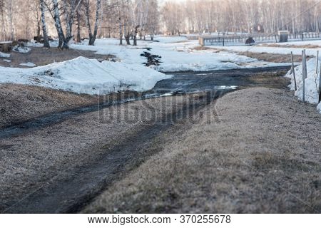 Spring Is On The Street. Dirty Snow. Snow Melts. Spring Weather.