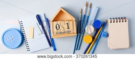 1 Septemder, Day Of Knowlege, School Supplies On Blue Board Background. Back To School Concept, Mono