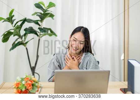 Beautiful Young Asian Woman Using Video Conference Call To People,work From Home,work At Home