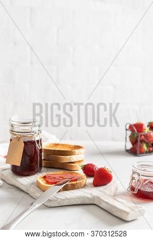 Healthy Breakfast With Natural Organic Strawberry Jam Or Marmalade And Toasts On White Background. S