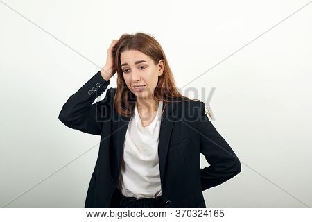 Forgetful Holding Hand To Hair, Touches Head Forgot Something Important She Regrets About Mistake Fe