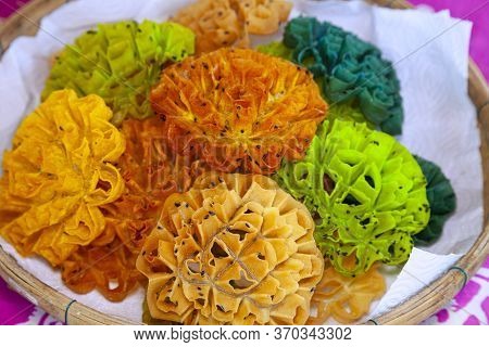 Thai Desserts Are Named Dok Jok. Is A Thai Dessert Made From Flour Mixed With Sugar And Then Fried I