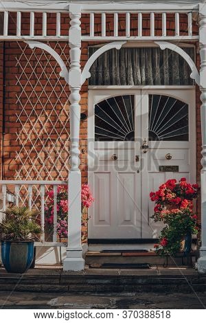 London, Uk - May 26, 2020: White Stained Glass Front Door Of Edwardian House In London, Sunlight Hit