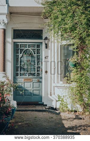 London, Uk - May 26, 2020: Pastel Stained Glass Front Door Of Edwardian House In London, Sunlight Hi