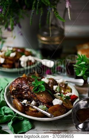 Slow Cooked Greek Lamb With Lemon Garlic Potatoes Lamb Kleftiko..style Rustic.selective Focus