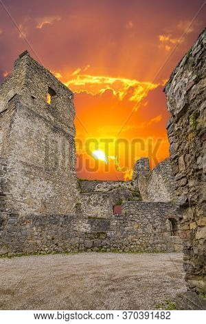 Ruined Fortress Wall With Loophole And Tower  Against The Sky.  Gallenstein Castle Inside. Municipal