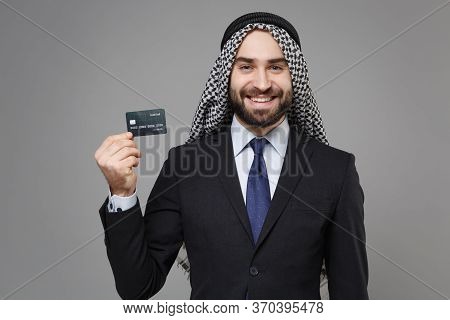 Smiling Bearded Arabian Muslim Businessman In Keffiyeh Kafiya Ring Igal Agal Classic Black Suit Shir