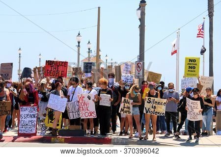 June 7, 2020 In Huntington Beach, Ca:  Black Lives Matter Protest At An Affluent Caucasian Community