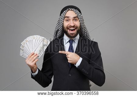 Excited Bearded Arabian Muslim Businessman In Keffiyeh Kafiya Ring Igal Agal Black Suit Isolated On 