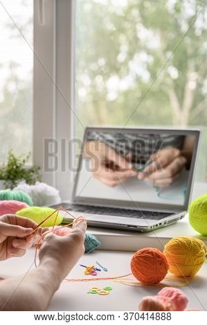 Selective Focus On The Hands Of A Man Sitting At The Table And Watching A Video Step By Step Guide O