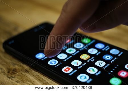 Rome, Italy - June 8 2020: Man Tap On Italian Covid19 Contact Tracing App Immuni On Smarphone Store,