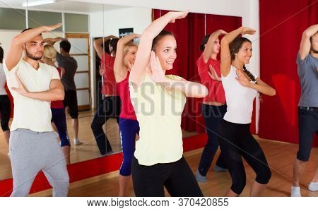 Yound Couples Dancing Contemp In Studio Smiling And Having Fun