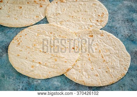 pita bread on the ble background