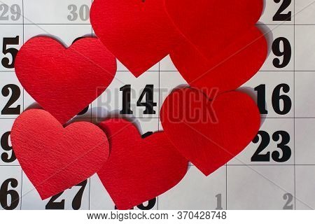 Calendar Page With The Red Hearts On February 14 Of Saint Valentines Day.