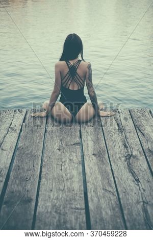 Beautiful Young Woman In Beachwear Near Water. Female Sexy Body. Perfect Body. Beautiful Young Woman