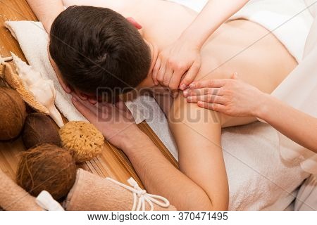 Young Man With Hands Of Masseur