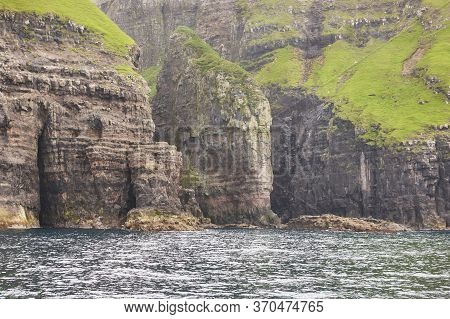 Faroe Islands Cliffs And Caves In Vestmanna Area. Streimoy Island