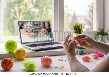 Selective Focus On The Hands Of A Man Sitting At The Table And Watching A Video Step By Step Guide O