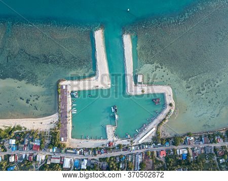 Aerial View Of Baan Tai Pier Or Huatean Pier At Phangan Island With Clear Blue Sky, Thailand