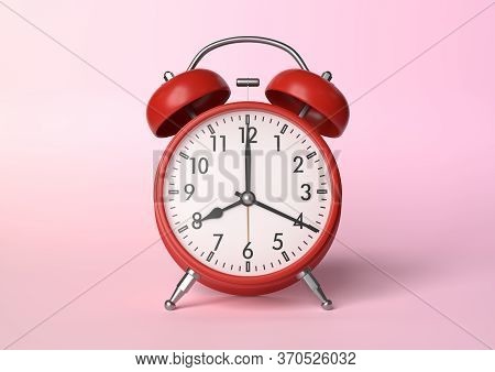 Red Vintage Alarm Clock On Bright Pink Background In Pastel Colors. Minimal Creative Concept. Front 
