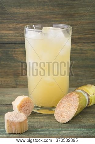Piece Of Sugarcane Juice In A Glass - Saccharum Officinarum
