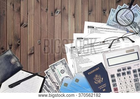 Irs Form 1120 U.s. Corporation Income Tax Return Lies On Flat Lay Office Table And Ready To Fill. U.