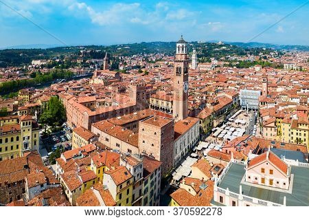 Torre Dei Lamberti Aerial Panoramic View. Torre Lamberti Is Tower In Piazza Delle Erbe Square In Ver